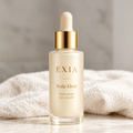 EXIA Scalp Elixir sur une surface claire avec serviette blanche